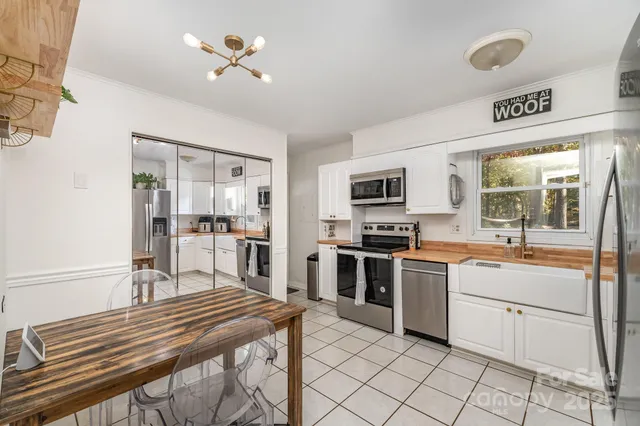 a bathroom with a sink toilet and mirror