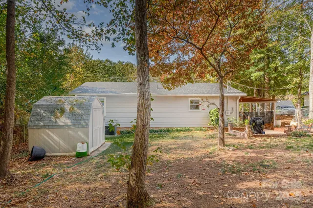a house view with a backyard space
