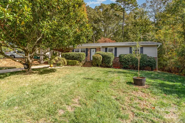 a backyard of a house with seating space
