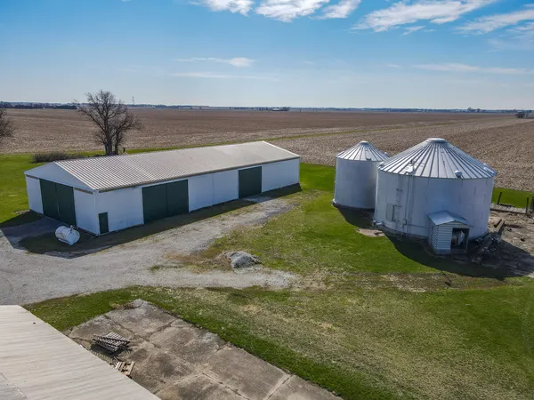 an aerial view of a house with roof deck