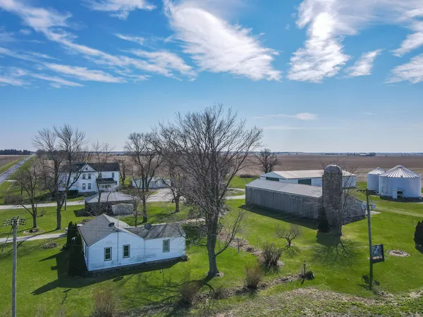 a kitchen with stainless steel appliances granite countertop a refrigerator and cabinets