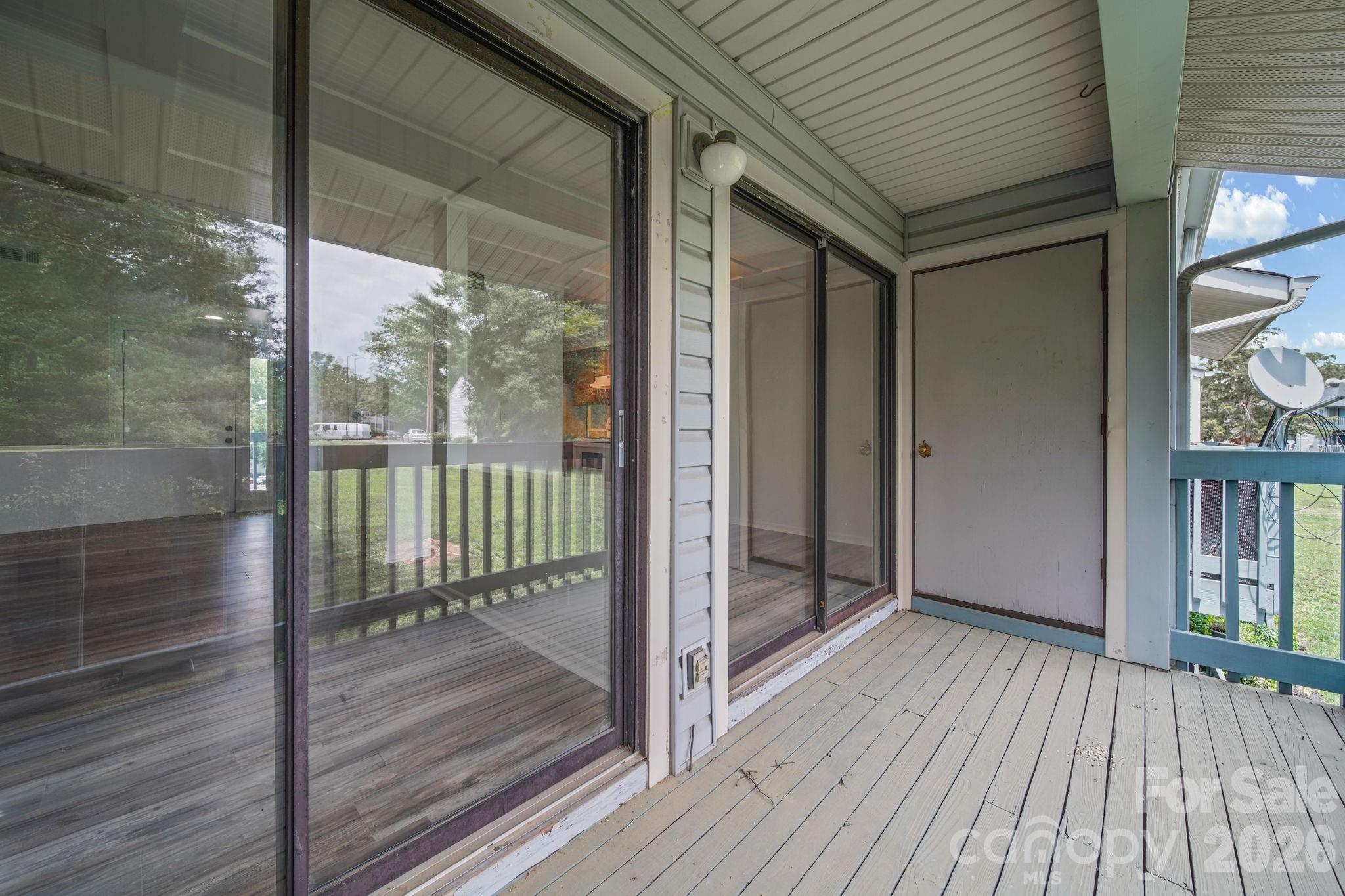 11023 Harrowfield Road Charlotte, NC 28226 - Photo 16 of 32 a view of a balcony with wooden floor