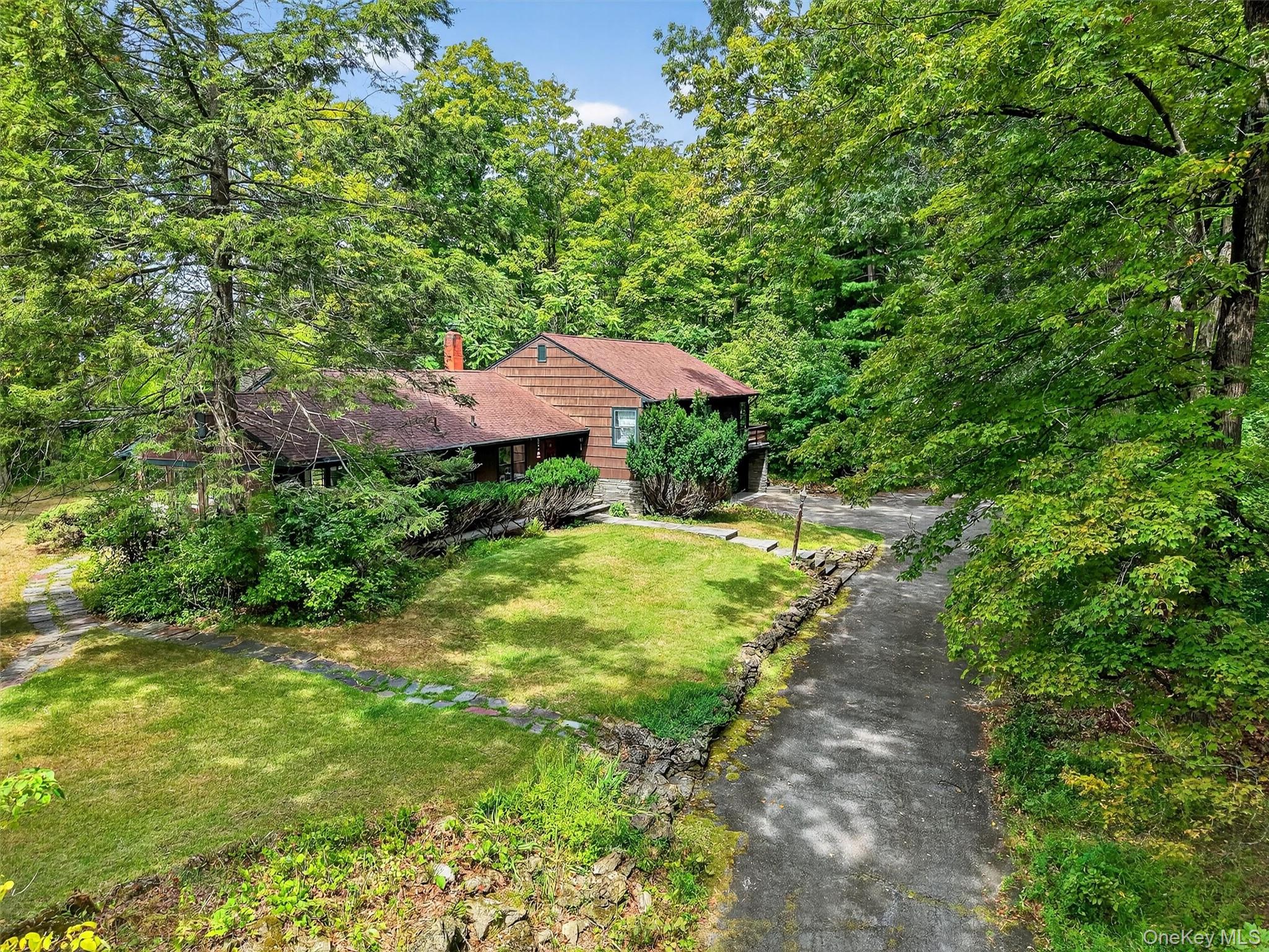 19 Ridgeview Road Poughkeepsie, NY 12603 - Photo 2 of 50 a swimming pool with outdoor seating and yard