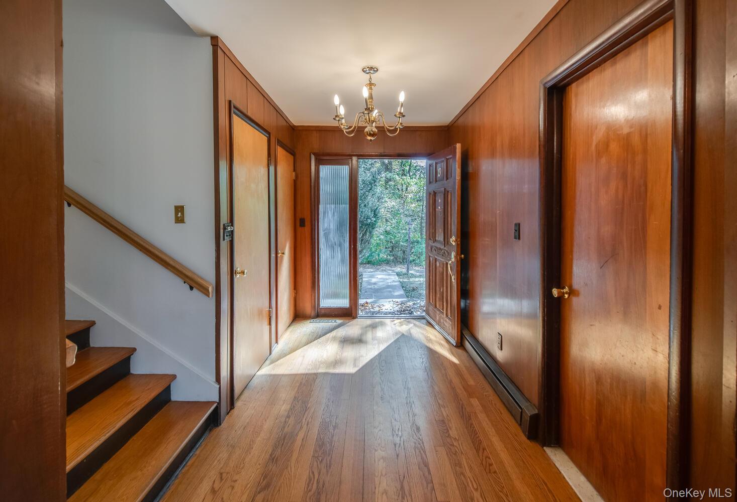 19 Ridgeview Road Poughkeepsie, NY 12603 - Photo 3 of 50 a view of a hallway with wooden floor and staircase