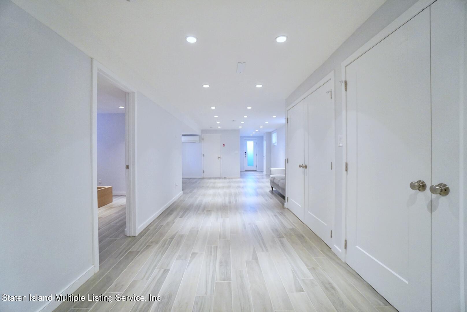644 West Fingerboard Road Staten Island, NY 10305 - Photo 23 of 32 (23) FULL FINISHED BASEMENT