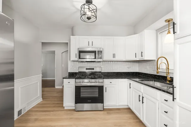 a bed room with a bed and a window