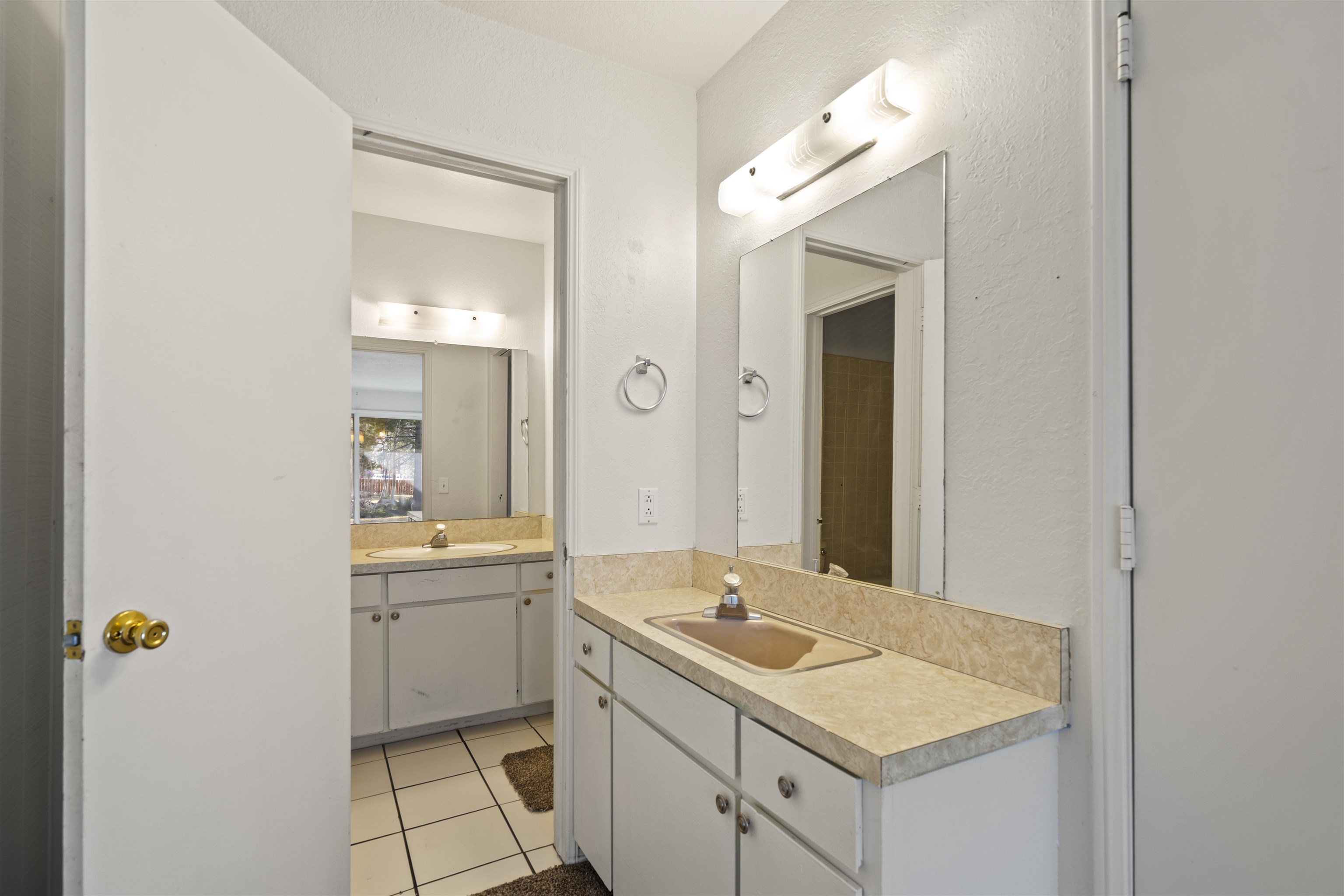 3199 Chateau Road, Unit 18 Mammoth Lakes, CA 93546 - Photo 14 of 19 Bathroom with vanity and light tile patterned flooring