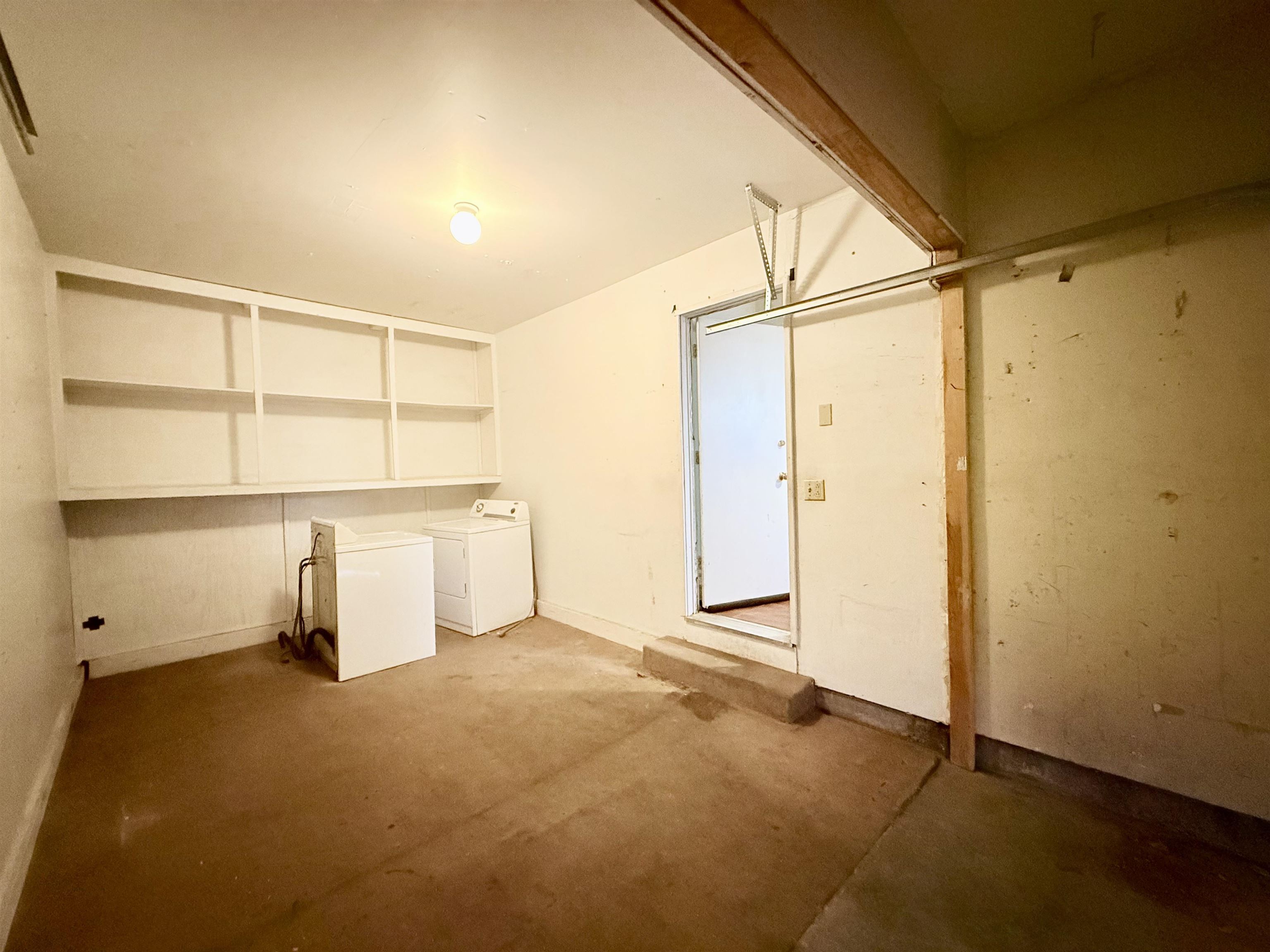 3199 Chateau Road, Unit 18 Mammoth Lakes, CA 93546 - Photo 17 of 19 Washroom featuring independent washer and dryer and unfinished concrete flooring