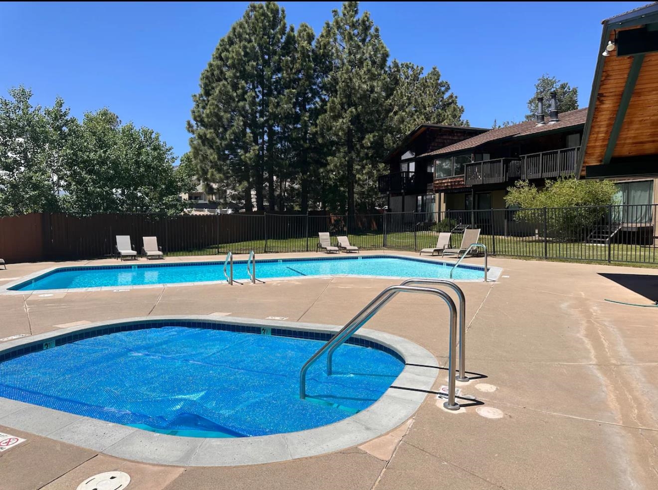 3199 Chateau Road, Unit 18 Mammoth Lakes, CA 93546 - Photo 18 of 19 Community pool with a patio