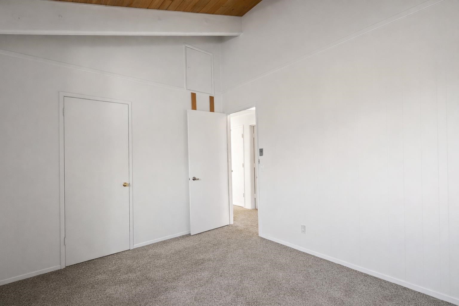 3199 Chateau Road, Unit 18 Mammoth Lakes, CA 93546 - Photo 7 of 19 Unfurnished bedroom with carpet floors, high vaulted ceiling, and a wooden ceiling with exposed beams