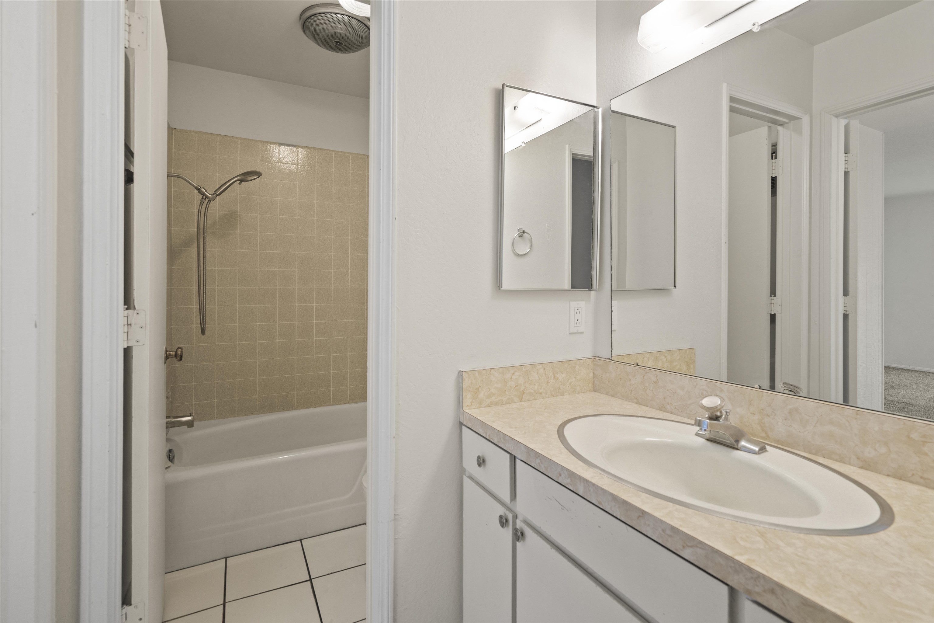 3199 Chateau Road, Unit 18 Mammoth Lakes, CA 93546 - Photo 10 of 19 Bathroom with bathing tub / shower combination, vanity, and light tile patterned floors