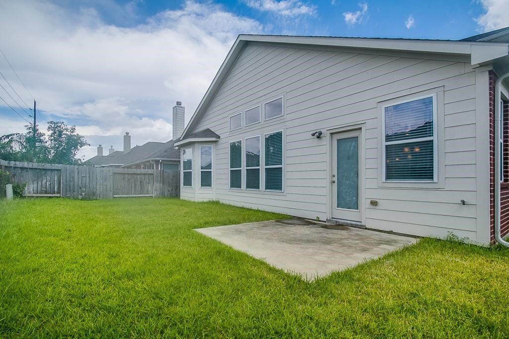 5803 Cedar Field Way Houston, TX 77084 - Photo 14 of 14 a view of a house with a garden