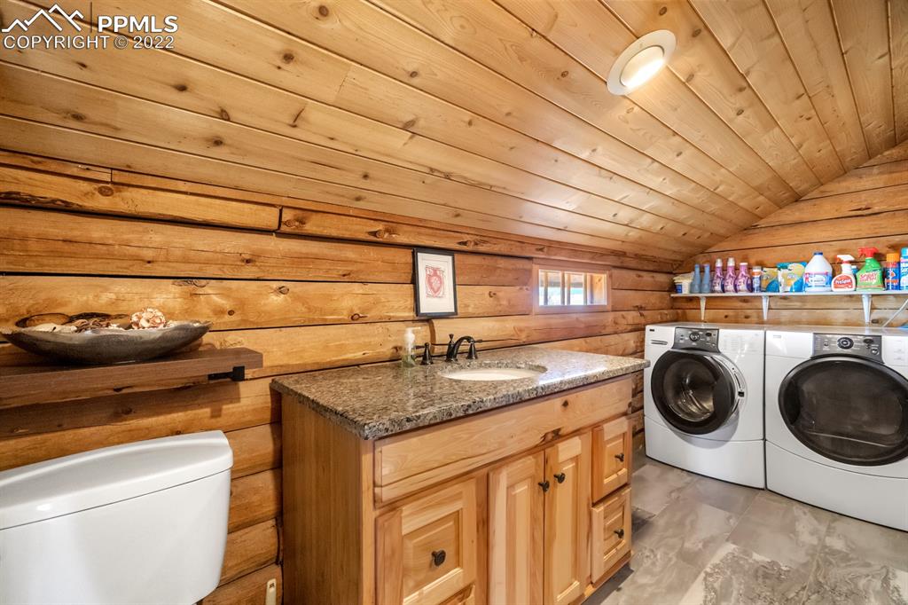 3645 Doolittle Road Monument, CO 80132 - Photo 14 of 39 a utility room with dryer and washer