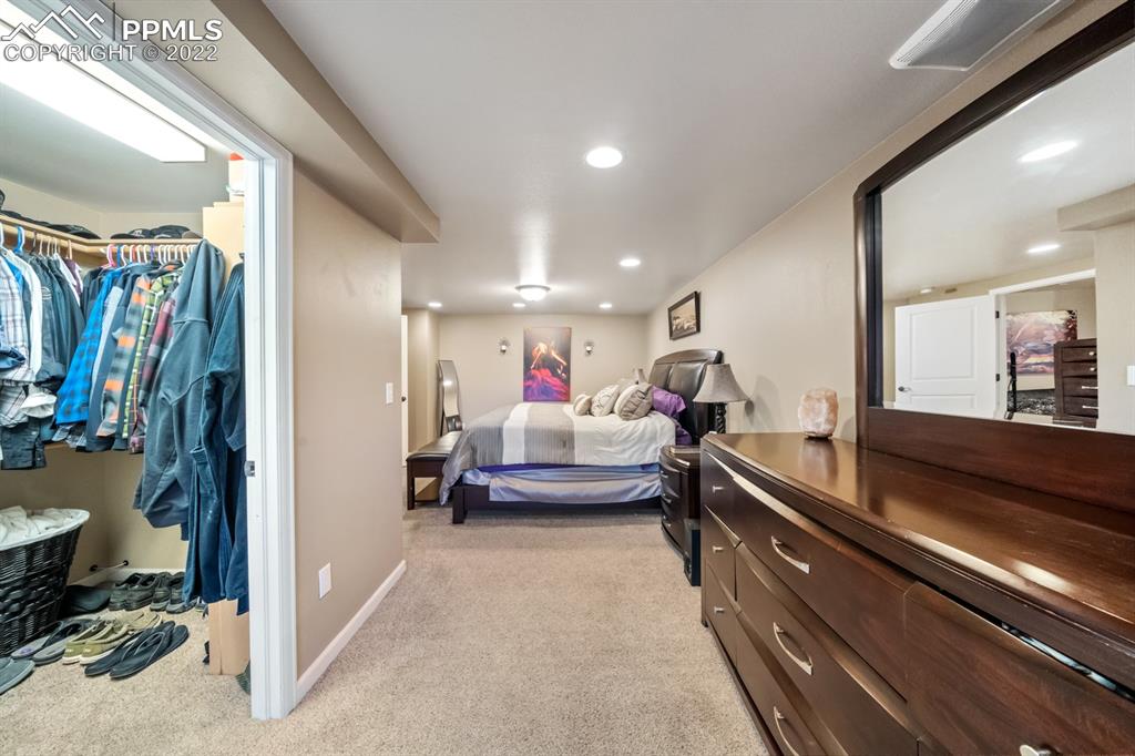 3645 Doolittle Road Monument, CO 80132 - Photo 21 of 39 a living room with furniture and a couch