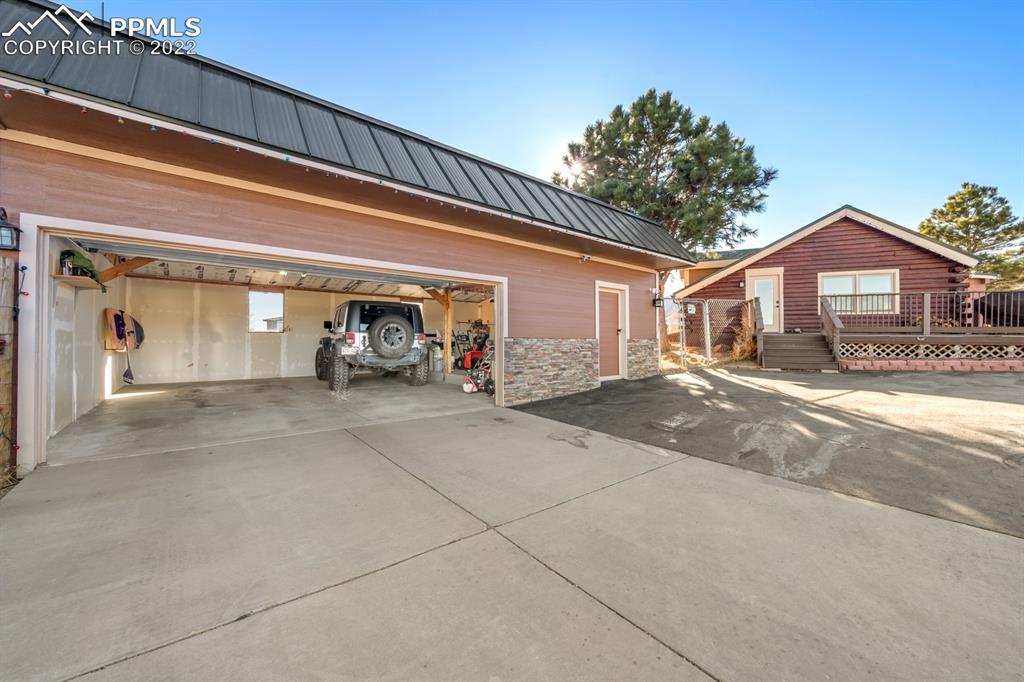 3645 Doolittle Road Monument, CO 80132 - Photo 24 of 39 a view of a car garage of a house