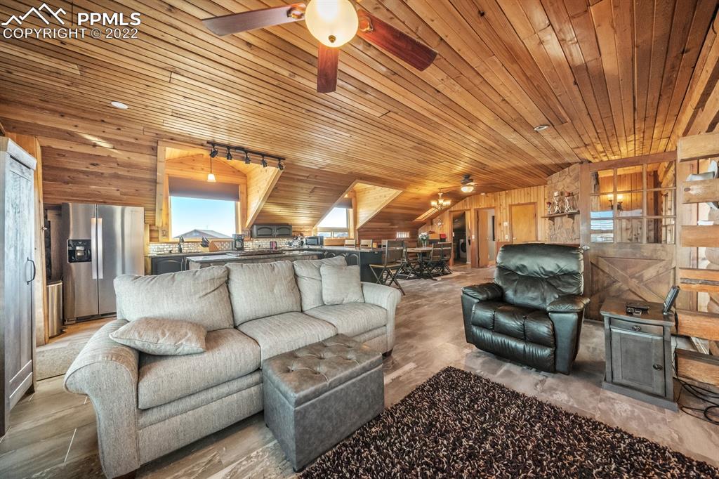 3645 Doolittle Road Monument, CO 80132 - Photo 3 of 39 a living room with furniture
