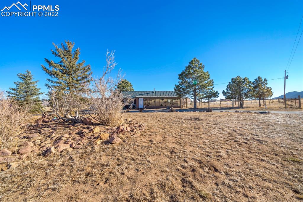 3645 Doolittle Road Monument, CO 80132 - Photo 32 of 39 a view of outdoor space with garden
