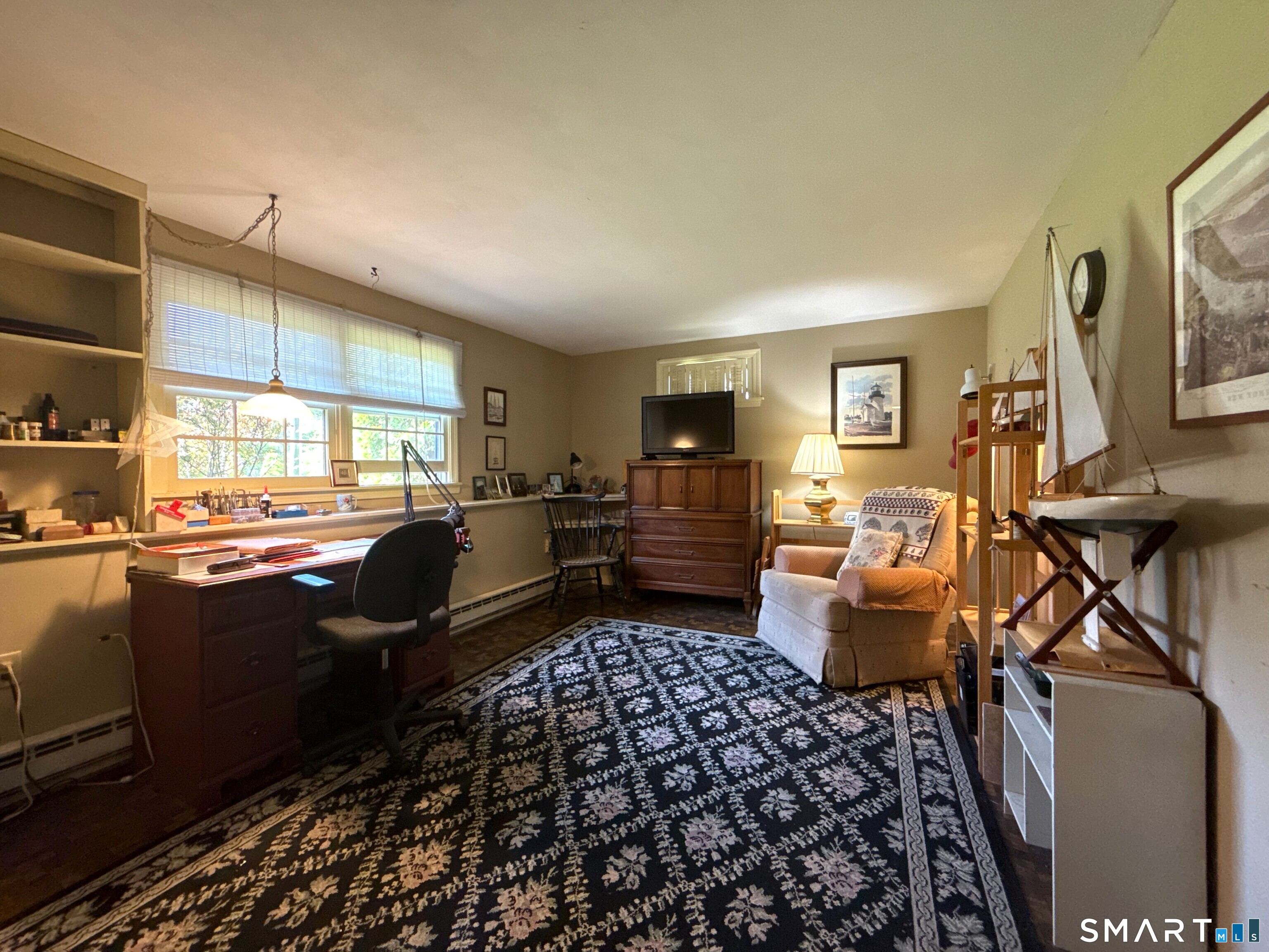 15 Grove Street Deep River, CT 06417 - Photo 21 of 25 a living room with furniture or couch and a window