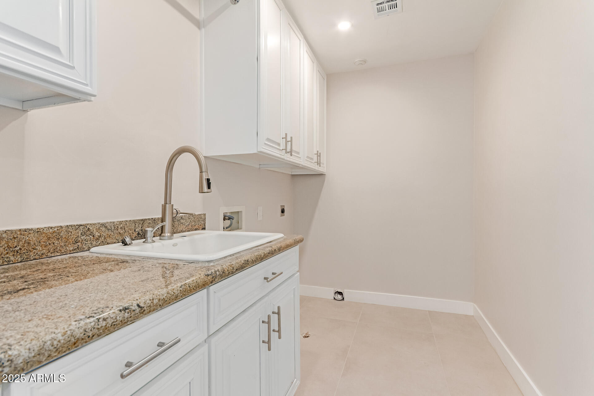 3301 East Rovey Avenue Paradise Valley, AZ 85253 - Photo 58 of 105 a bathroom with a sink and vanity