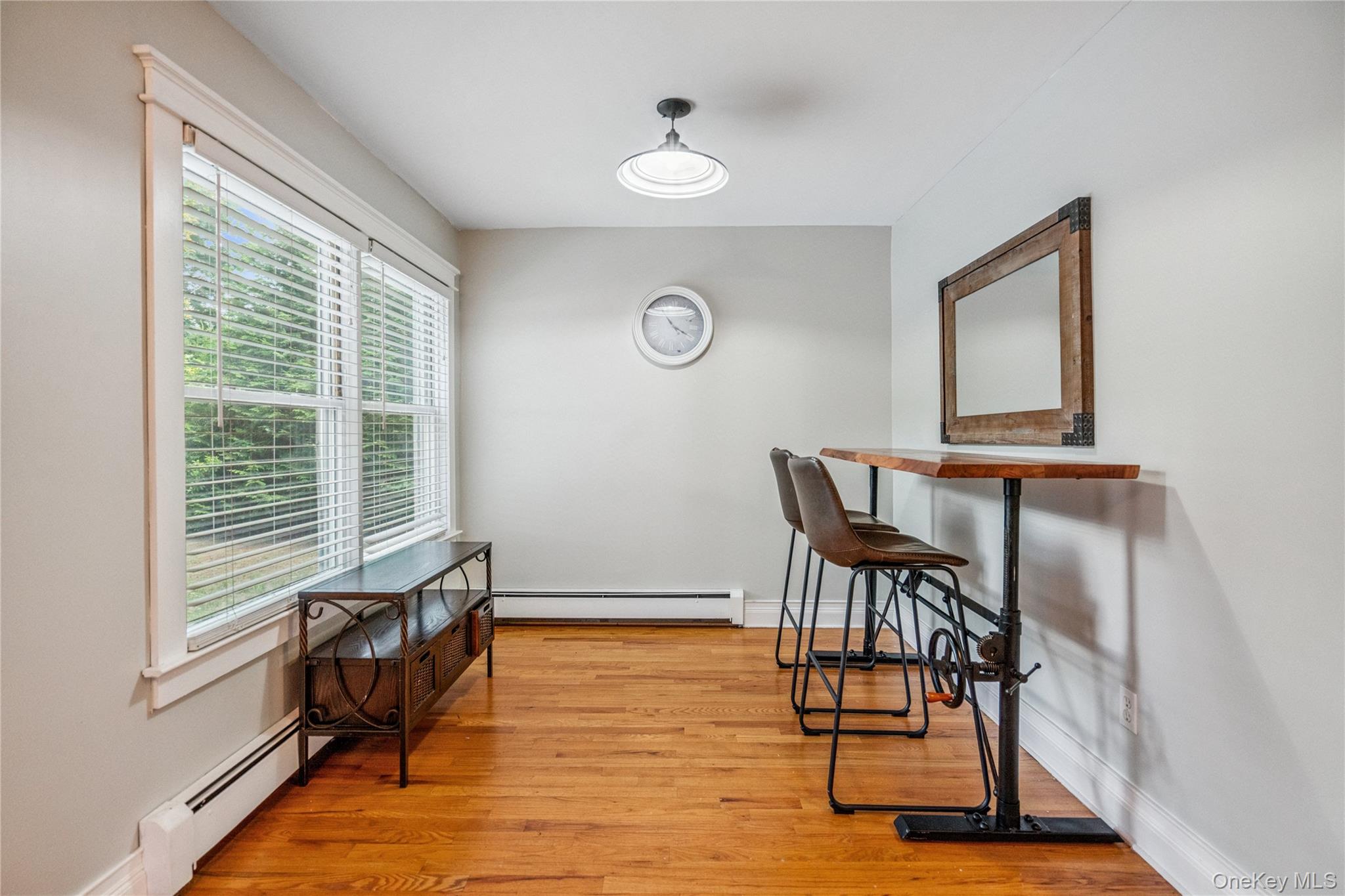 17 Tulip Road Rocky Point, NY 11778 - Photo 13 of 24 a view of a room with furniture window and wooden floor