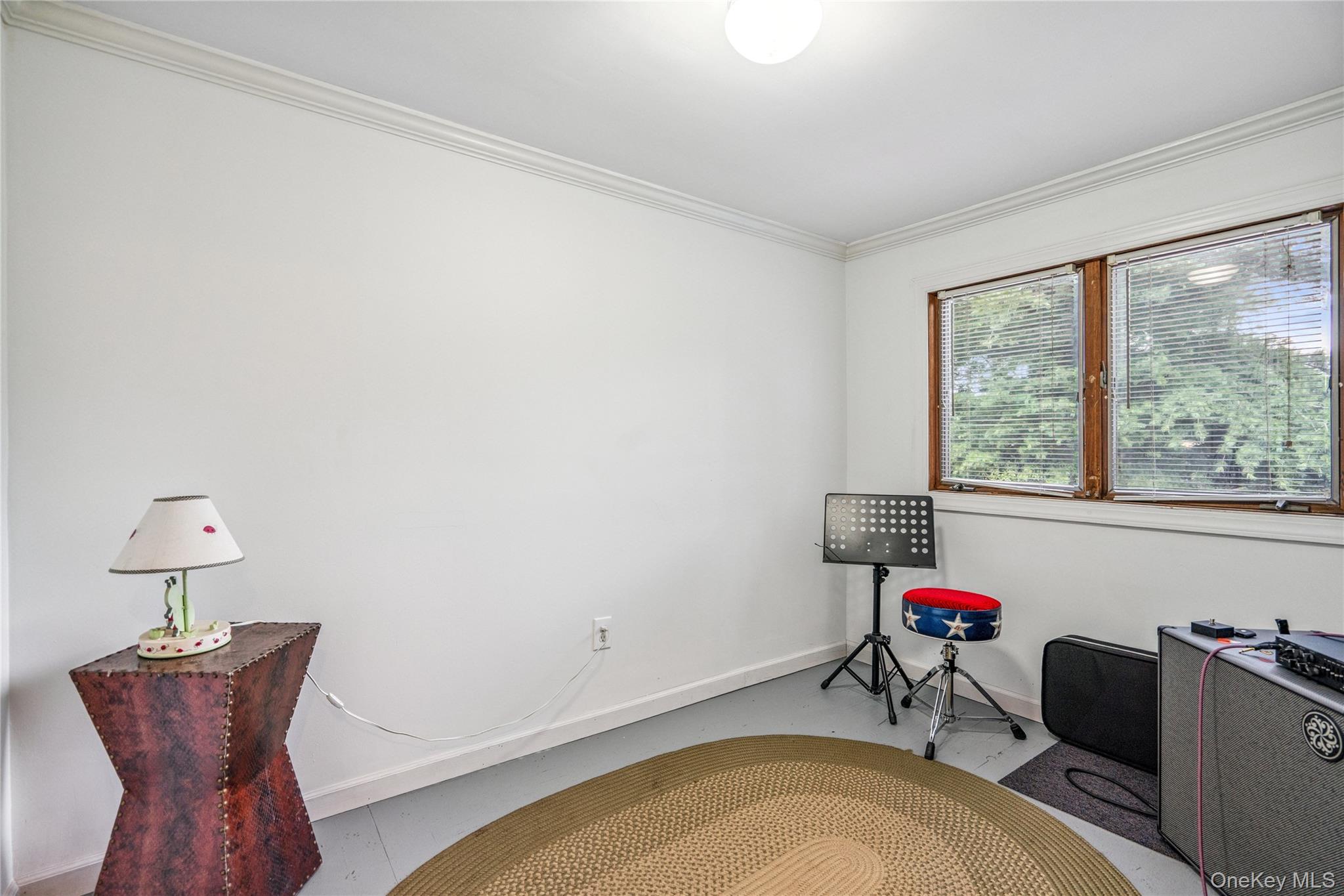 17 Tulip Road Rocky Point, NY 11778 - Photo 18 of 24 a workspace with furniture and a window