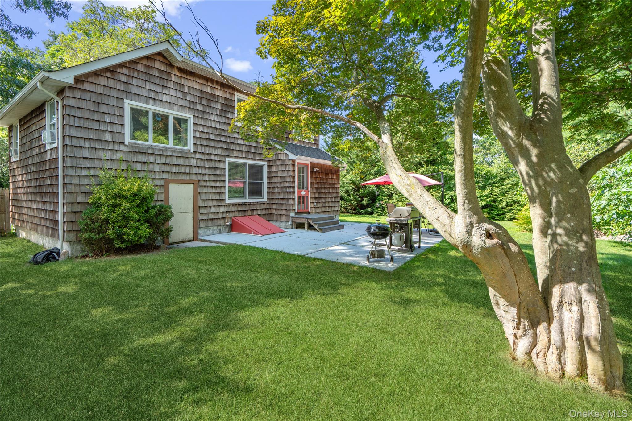 17 Tulip Road Rocky Point, NY 11778 - Photo 24 of 24 a view of a house with a yard