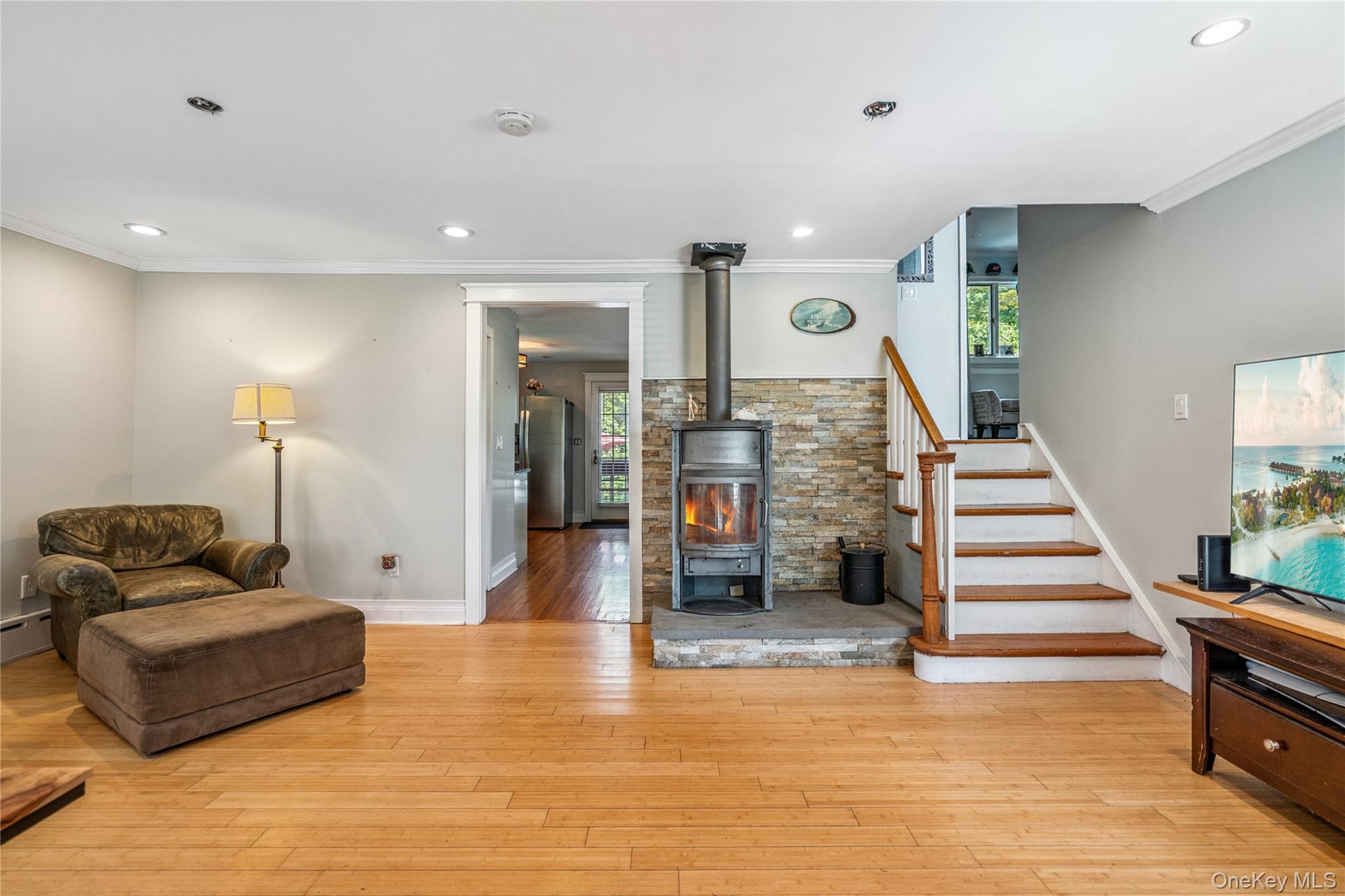 17 Tulip Road Rocky Point, NY 11778 - Photo 5 of 24 a living room with furniture and stairs