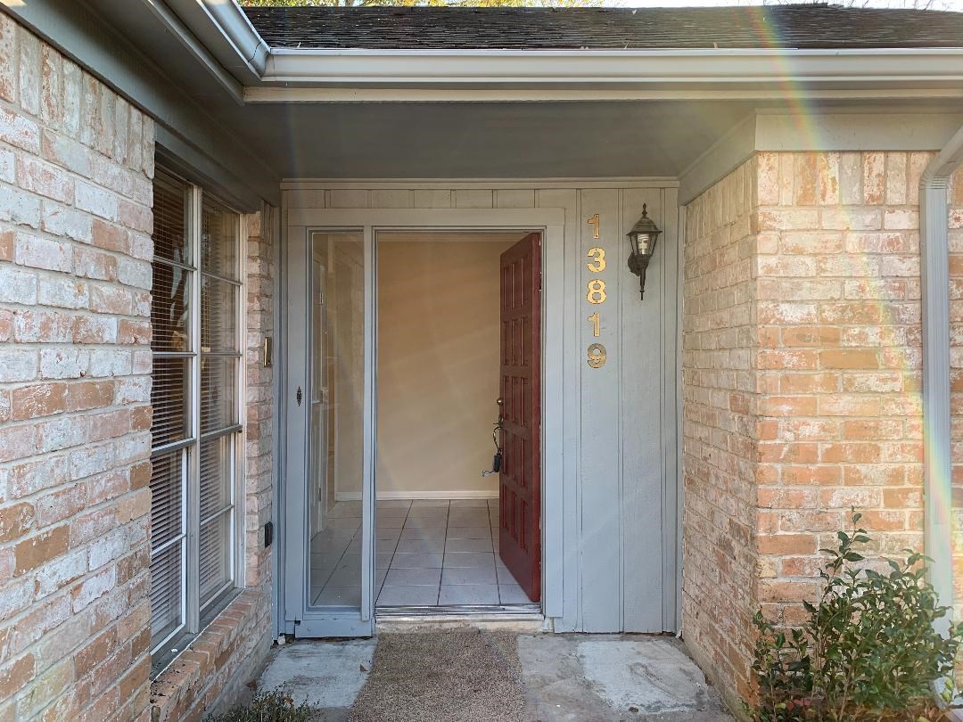 13819 Piping Rock Lane Houston, TX 77077 - Photo 2 of 16 a view of wooden door