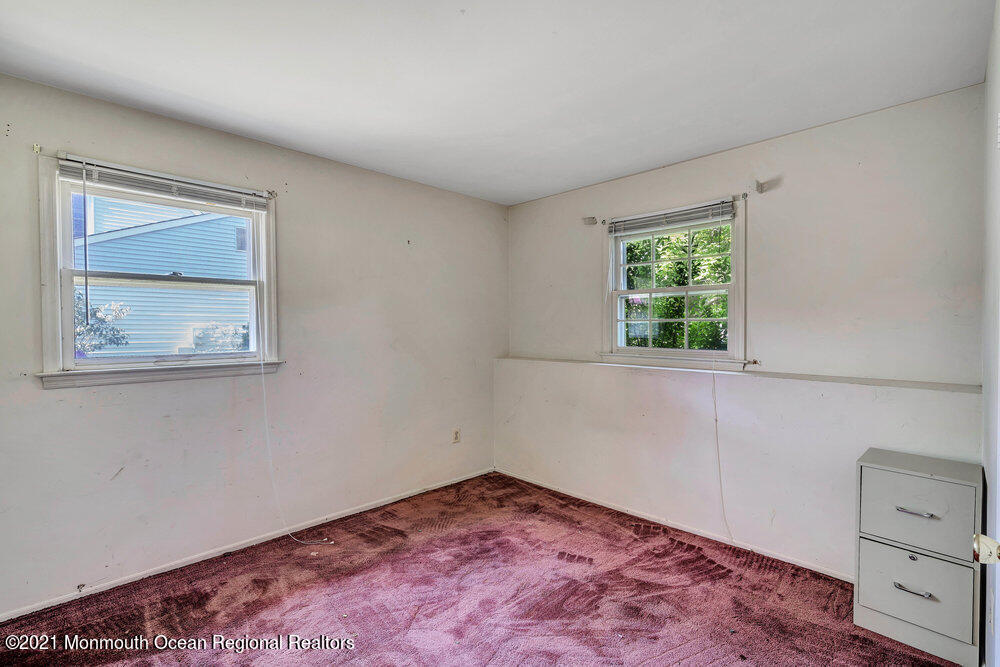 60 Charles Drive Tinton Falls, NJ 07753 - Photo 15 of 23 an empty room with a window