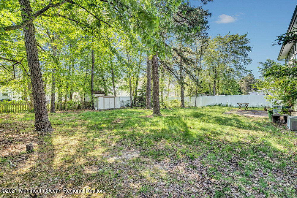 60 Charles Drive Tinton Falls, NJ 07753 - Photo 22 of 23 a view of outdoor space with deck and tree