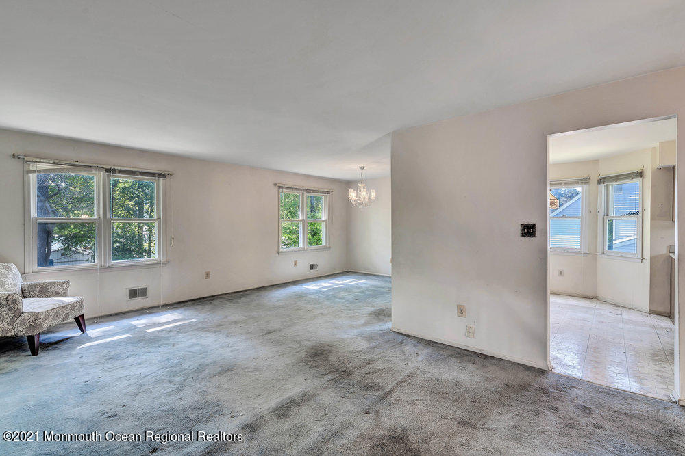 60 Charles Drive Tinton Falls, NJ 07753 - Photo 6 of 23 an empty room with windows