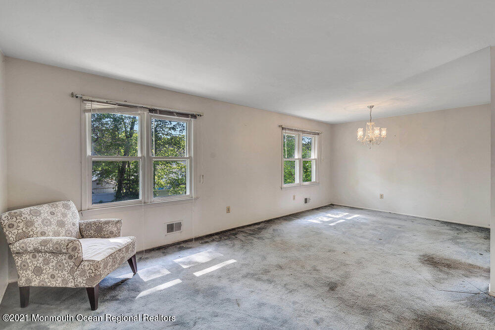 60 Charles Drive Tinton Falls, NJ 07753 - Photo 7 of 23 an empty room with a window