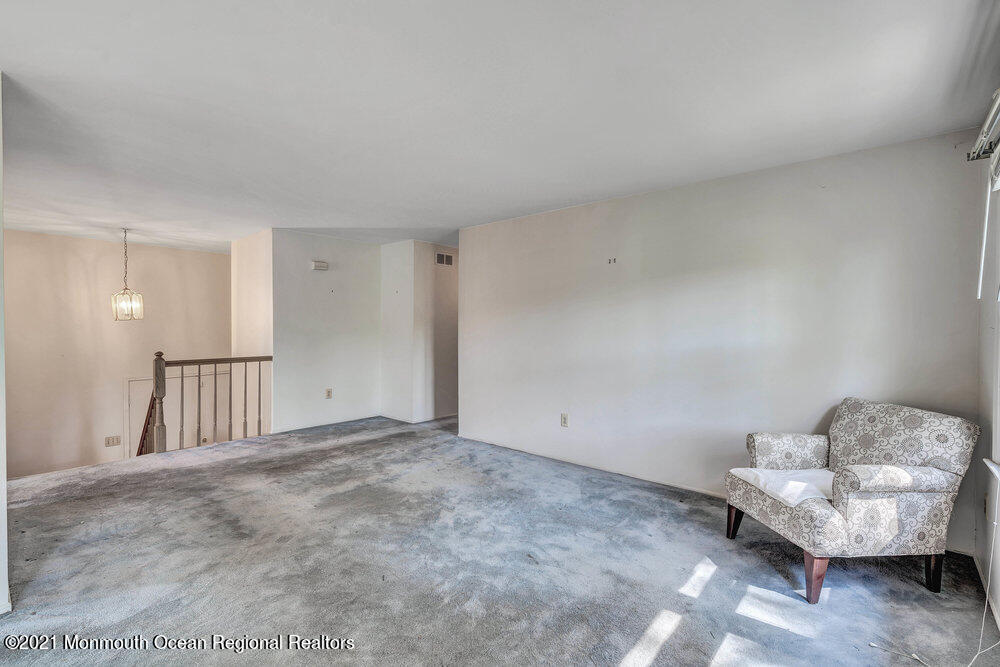 60 Charles Drive Tinton Falls, NJ 07753 - Photo 8 of 23 a view of an empty room and glass door