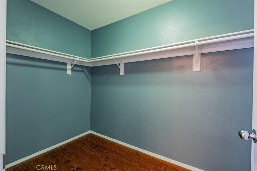 6349 Catania Court Palmdale, CA 93552 - Photo 24 of 36 a view of a room with rack on the wall