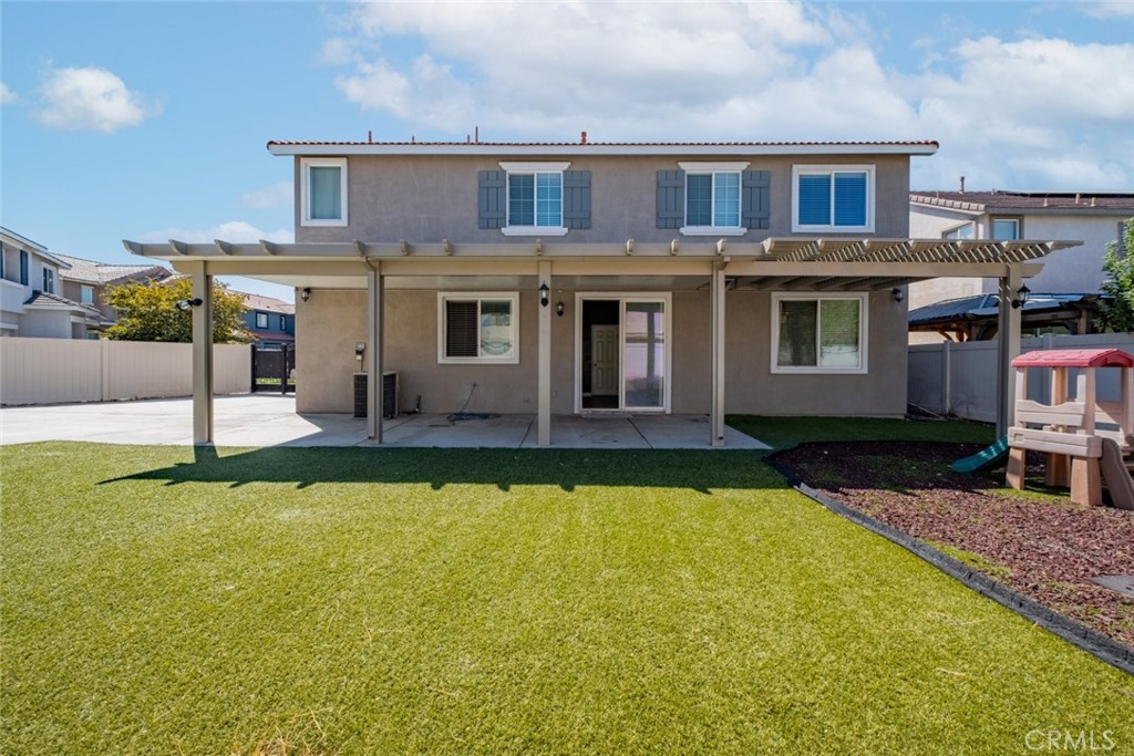 6349 Catania Court Palmdale, CA 93552 - Photo 34 of 36 a view of a house with swimming pool and sitting area