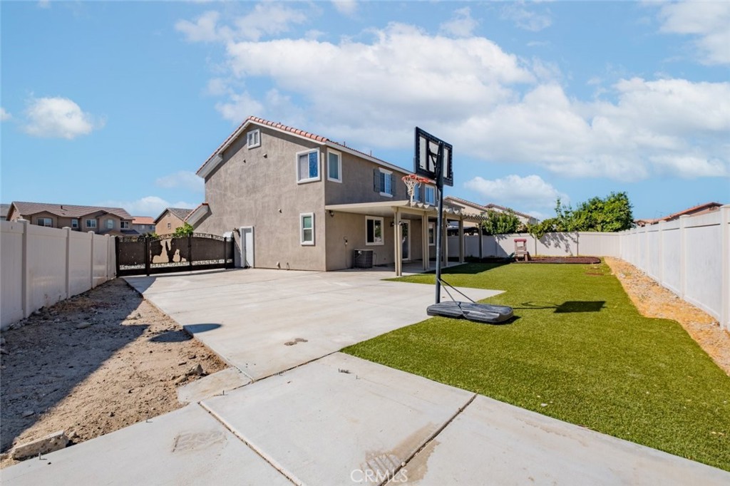 6349 Catania Court Palmdale, CA 93552 - Photo 35 of 36 a view of a house with entertaining space