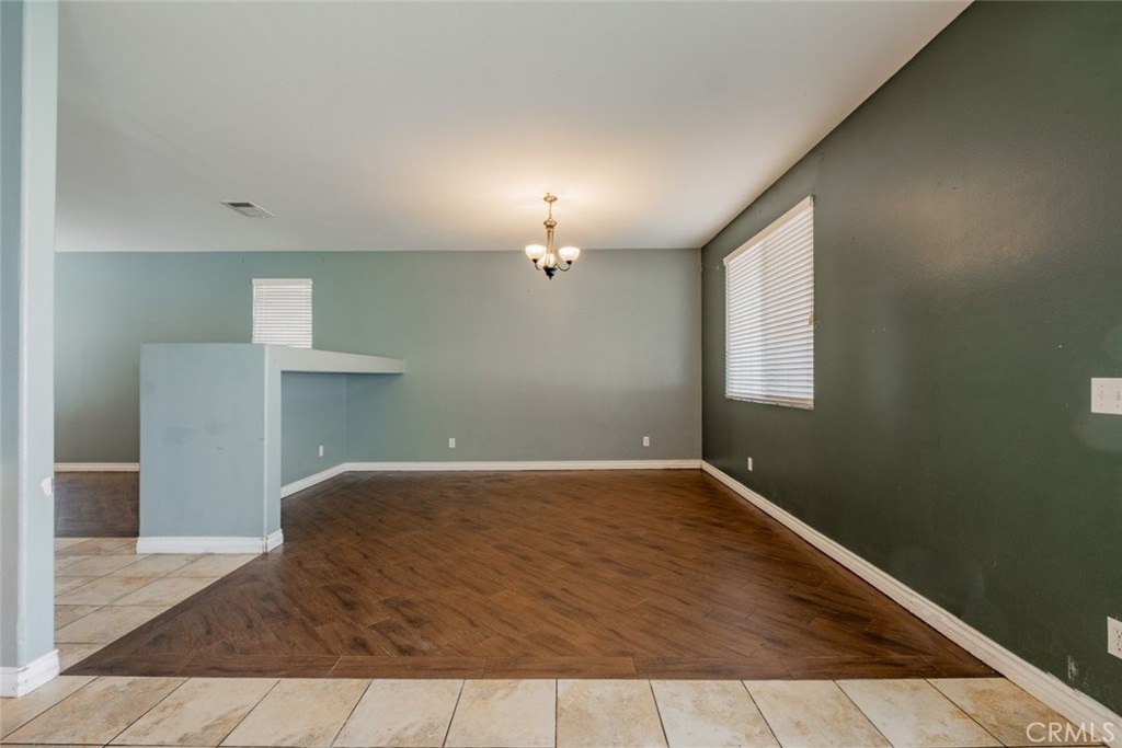 6349 Catania Court Palmdale, CA 93552 - Photo 10 of 36 a view of a livingroom with a dishwasher