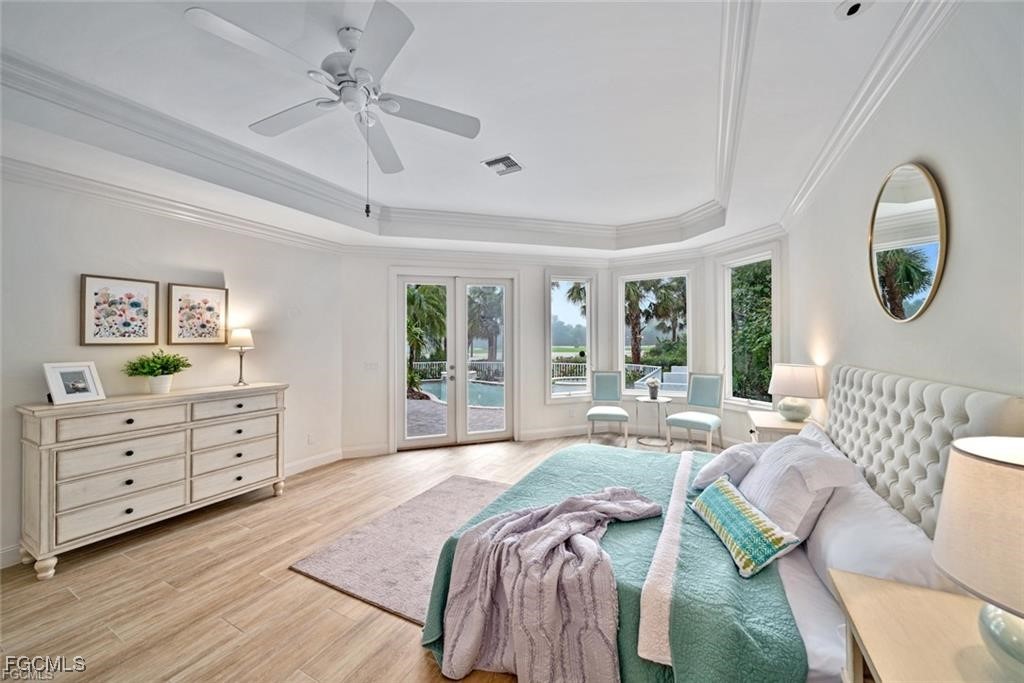 2402 Wulfert Road Sanibel, FL 33957 - Photo 18 of 47 a bed room with a bed and a fish tank