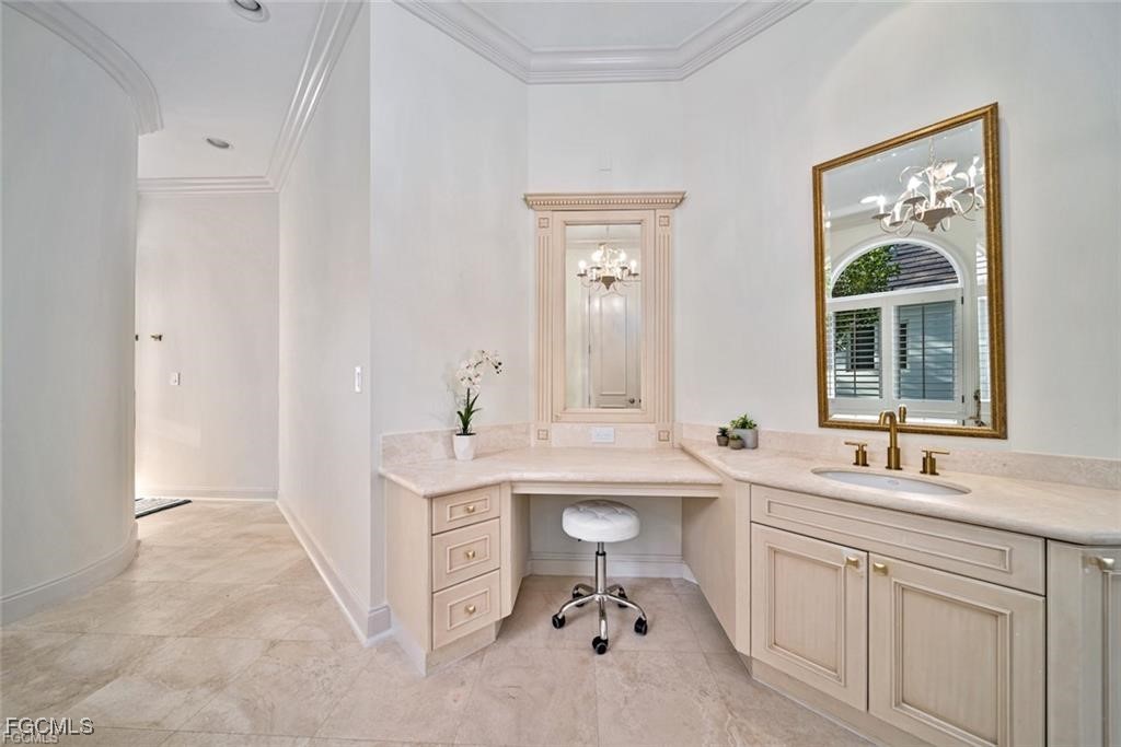 2402 Wulfert Road Sanibel, FL 33957 - Photo 24 of 47 a spacious bathroom with a sink mirror and a bathtub