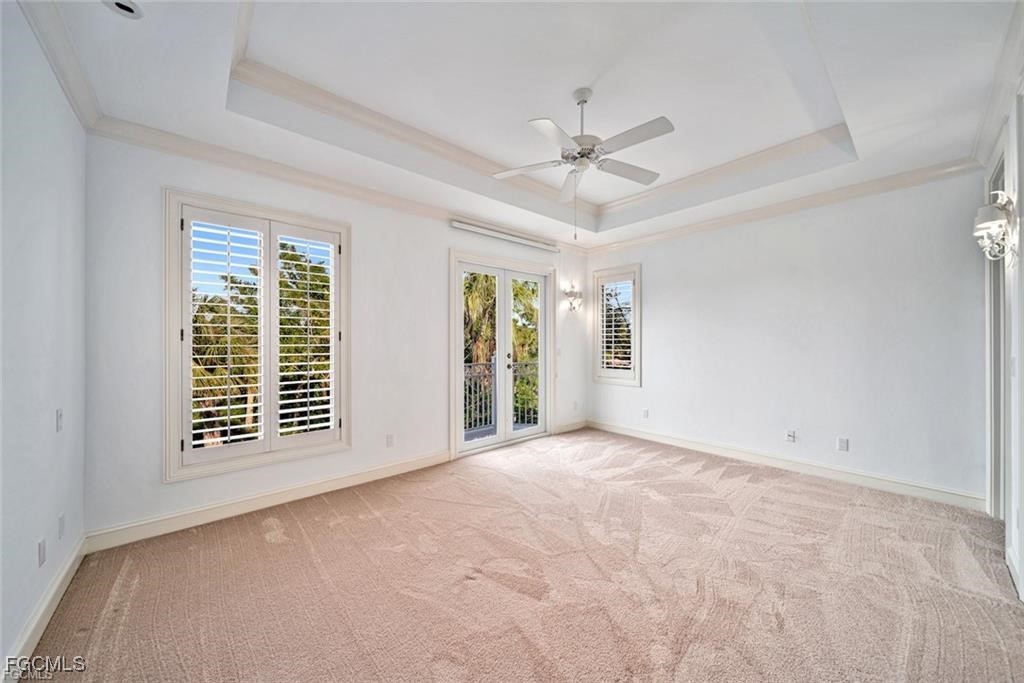 2402 Wulfert Road Sanibel, FL 33957 - Photo 28 of 47 a view of an empty room with a window