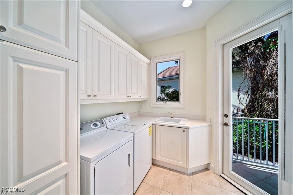 2402 Wulfert Road Sanibel, FL 33957 - Photo 32 of 47 a view of a kitchen with electric appliances