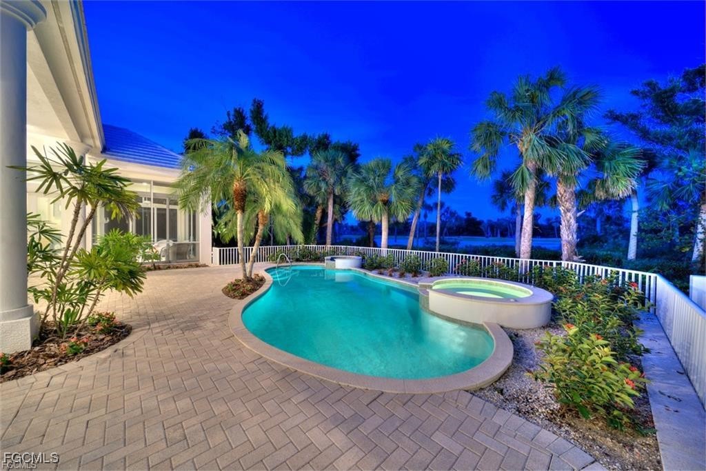 2402 Wulfert Road Sanibel, FL 33957 - Photo 41 of 47 a view of a swimming pool with a patio