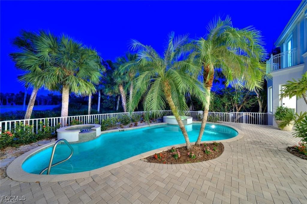 2402 Wulfert Road Sanibel, FL 33957 - Photo 43 of 47 a view of a backyard with a fountain and plants