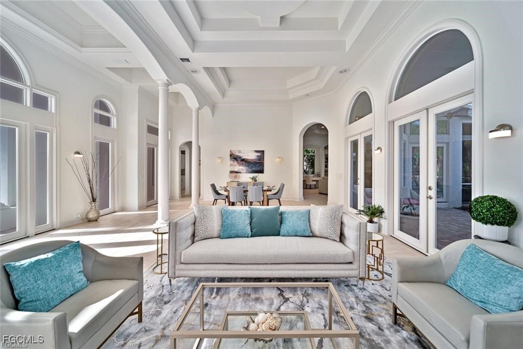 2402 Wulfert Road Sanibel, FL 33957 - Photo 5 of 47 a living room with furniture and a rug