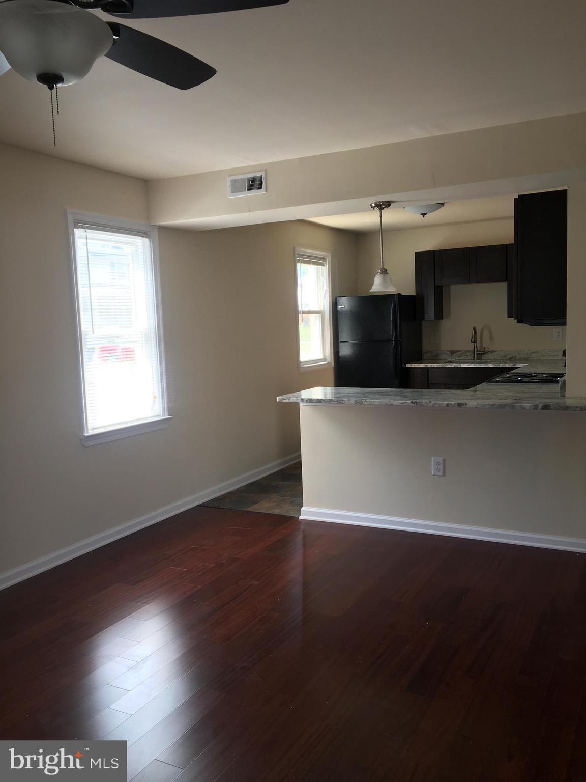 1 Pennsylvania Road, Unit 4 Glassboro, NJ 08028 - Photo 22 of 37 a view of kitchen with furniture and flat screen tv