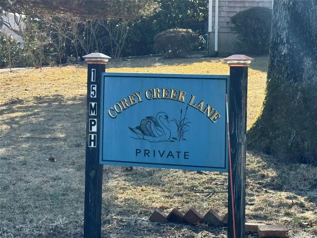 a sign on the side of the road