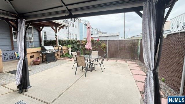 760 Hamilton Street, Unit 1 Harrison, NJ 07029 - Photo 22 of 23 a view of a porch with chairs