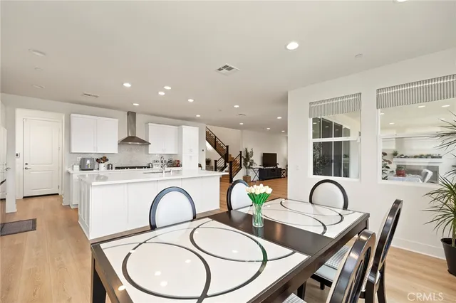 a kitchen with a stove and a microwave