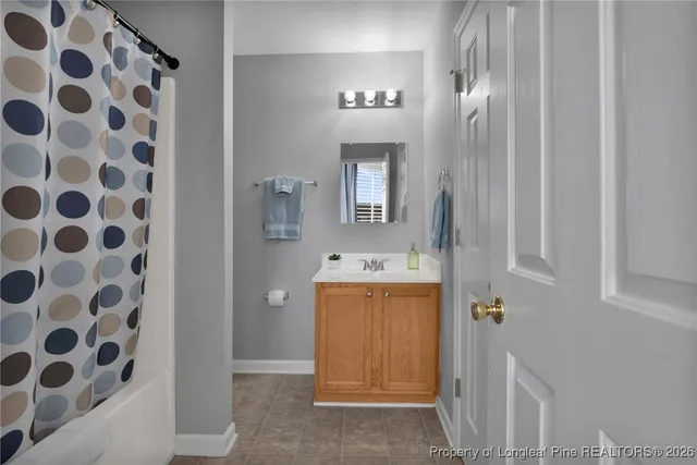 a utility room with closet dryer and washer