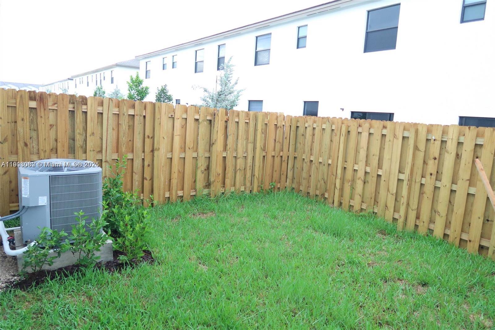 12946 Southwest 231st Street Miami, FL 33170 - Photo 11 of 42 a view of a back yard